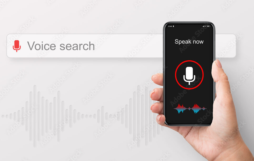 Female Hand Holding Smart Phone Using Voice Search, White Background